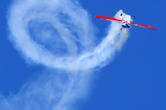 Aerobatic stunt in Extra 300 stunt plane.